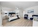 Serene main bedroom with luxury bedding, ceiling fan, and calm decor at 2900 Sandpiper Pl, Clearwater, FL 33762