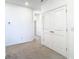 Hallway with closet and carpet at 31771 Blue Passing Loop, Wesley Chapel, FL 33545
