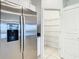 Spacious pantry featuring wire shelving for optimal organization and storage at 31771 Blue Passing Loop, Wesley Chapel, FL 33545