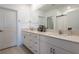 Bright bathroom with double vanity, modern fixtures, and ample cabinet space at 35100 Brackett Bnd, Zephyrhills, FL 33541
