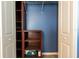 Organized closet featuring built-in shelves and ample storage, showcasing efficient use of space at 35100 Brackett Bnd, Zephyrhills, FL 33541