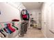 Spacious walk-in closet with ample shelving and hanging storage at 35100 Brackett Bnd, Zephyrhills, FL 33541