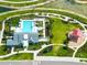 Aerial view of a large community pool, recreation area, and playground at 35100 Brackett Bnd, Zephyrhills, FL 33541