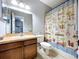 This bathroom features linoleum flooring, a mirror, and a decorated shower curtain at 3544 Brook Crossing Dr, Brandon, FL 33511