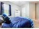 This bedroom features carpet, a ceiling fan, and a sailboat decoration at 3544 Brook Crossing Dr, Brandon, FL 33511