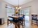 Dining room table with slider to patio at 3544 Brook Crossing Dr, Brandon, FL 33511