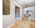 Inviting foyer featuring tiled flooring, an open floor plan, and a view into the adjoining living spaces at 3544 Brook Crossing Dr, Brandon, FL 33511