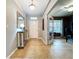 Shot of home foyer area with adjacent office space to the right of the front door at 3544 Brook Crossing Dr, Brandon, FL 33511