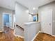 Second floor hallway with hardwood floors at 3544 Brook Crossing Dr, Brandon, FL 33511