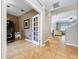 View into home office showing a desk and chair with view of living room at 3544 Brook Crossing Dr, Brandon, FL 33511