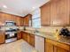 Kitchen with stainless appliances, granite counters and tile backsplash at 3544 Brook Crossing Dr, Brandon, FL 33511