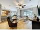 Inviting living room seamlessly connects to the kitchen and dining areas, great for entertaining at 3544 Brook Crossing Dr, Brandon, FL 33511