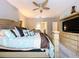Relaxing main bedroom with a large bed, ceiling fan, and TV console at 3544 Brook Crossing Dr, Brandon, FL 33511
