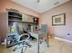 Office features a custom desk, ample storage, tile floor and neutral walls at 3544 Brook Crossing Dr, Brandon, FL 33511