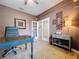 Home office with natural lighting, tile floor, stylish furniture, and decorative accents at 3544 Brook Crossing Dr, Brandon, FL 33511