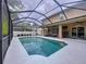 Relaxing pool with a screened enclosure and covered patio, ideal for outdoor entertainment at 3544 Brook Crossing Dr, Brandon, FL 33511