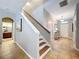 Staircase with wood steps and tiled floors lead to the second level at 3544 Brook Crossing Dr, Brandon, FL 33511