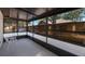 Enclosed patio featuring neutral flooring and large windows at 3705 Simpson Ct, Palm Harbor, FL 34684