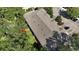 Aerial view of the property showing the building and surrounding landscaping at 37712 Aaralyn Rd, Zephyrhills, FL 33542