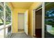 This screened patio has access to both the outside and inside of the home at 37712 Aaralyn Rd, Zephyrhills, FL 33542