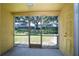 Screened patio providing an outdoor view of the yard and a comfortable space to relax at 37712 Aaralyn Rd, Zephyrhills, FL 33542