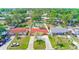 Wide aerial shot of a single-story home with a pool and long driveway at 4360 82Nd N Ave, Pinellas Park, FL 33781