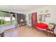 Enclosed lanai with tile flooring and a pleasant view of the backyard at 4360 82Nd N Ave, Pinellas Park, FL 33781