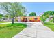 Charming single-story home with a well-manicured lawn and a spacious driveway, perfect for curb appeal at 4360 82Nd N Ave, Pinellas Park, FL 33781