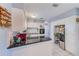 Well-lit kitchen with white cabinets, black countertops, and modern appliances offers a functional layout at 4360 82Nd N Ave, Pinellas Park, FL 33781