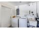 Practical laundry area equipped with a washer, dryer, and utility sink at 4360 82Nd N Ave, Pinellas Park, FL 33781