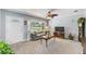 Cozy living room features plush carpeting, a large window, and comfortable seating with decorative touches at 4360 82Nd N Ave, Pinellas Park, FL 33781