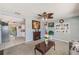 Open-concept living room flows seamlessly to kitchen creating a welcoming and functional living space at 4360 82Nd N Ave, Pinellas Park, FL 33781