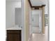 Bathroom featuring a modern vanity and a view into an adjacent room at 4831 Hillman Ter, North Port, FL 34288