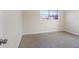 Vacant bedroom space with polished concrete flooring and plenty of natural light at 4925 Murray Hill Dr, Tampa, FL 33615