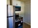 Close up of kitchen featuring stainless steel refrigerator and appliances at 4925 Murray Hill Dr, Tampa, FL 33615