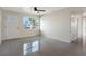 Bright living room with polished floors and large window offering plenty of natural light at 4925 Murray Hill Dr, Tampa, FL 33615