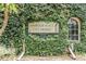 Attractive Harbour Place City Homes sign surrounded by mature landscaping at 501 Knights Run Ave # 6104, Tampa, FL 33602