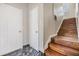 Welcoming entryway with hardwood stairs and elegant marble flooring, enhanced by natural light at 501 Knights Run Ave # 6104, Tampa, FL 33602