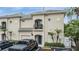 Inviting townhome with a private balcony and stylish architecture in a desirable neighborhood with assigned parking at 501 Knights Run Ave # 6104, Tampa, FL 33602