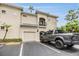 Inviting townhome with a private balcony, a garage, and stylish architecture in a desirable neighborhood at 501 Knights Run Ave # 6104, Tampa, FL 33602