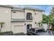 Inviting townhome with a private balcony, a garage, and stylish architecture in a desirable neighborhood at 501 Knights Run Ave # 6104, Tampa, FL 33602