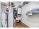 Well-organized walk-in closet with shelving for clothes, shoes, and accessories at 501 Knights Run Ave # 6104, Tampa, FL 33602