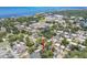 Aerial view of the neighborhood showing the home's location, surrounding trees, and nearby amenities at 527 Bay St, Dunedin, FL 34698