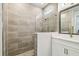 Elegant bathroom with a frameless glass shower and sleek fixtures at 527 Bay St, Dunedin, FL 34698