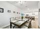 Inviting dining room with a view of the modern kitchen at 527 Bay St, Dunedin, FL 34698