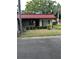 Charming single-story home featuring a red tile roof and well-maintained landscaping at 601 N Hercules Ave # 1008, Clearwater, FL 33765