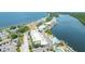Stunning aerial view of waterfront property, with tennis courts and swimming pool at 611 Destiny Dr # 509, Ruskin, FL 33570