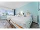 Bright main bedroom with two beds and beautiful beach views at 611 Destiny Dr # 509, Ruskin, FL 33570
