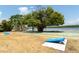 A large recreation area with shuffleboard, a large shade tree, and bay views at 611 Destiny Dr # 509, Ruskin, FL 33570