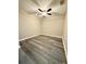 Bedroom with new flooring and a ceiling fan at 6333 Maisie Rd, Zephyrhills, FL 33542
